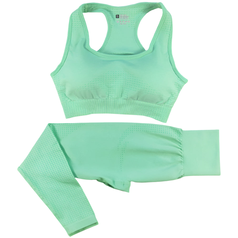 A collection of women's yoga clothing including a crop top and high-waisted leggings in various solid colors and patterns, displayed in multiple colors with size options.
