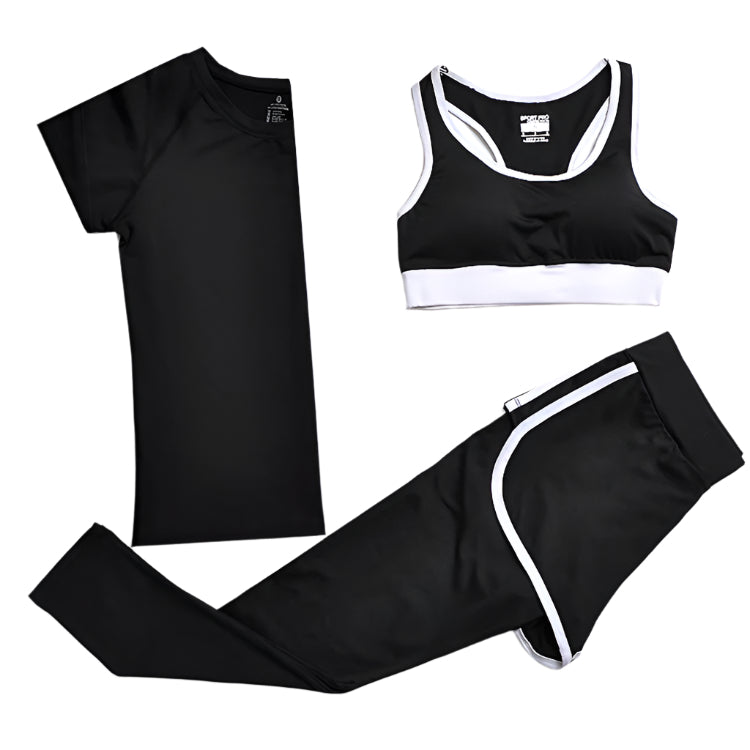 A set of yoga clothes consisting of a sports bra, a t-shirt, and leggings. The sports bra has white straps and a black center, the t-shirt is primarily black with black sleeves, and the leggings are black with white accents. 