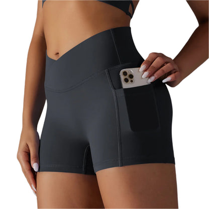 A collage of images displaying yoga shorts with a phone pocket in various solid colors worn by a model.